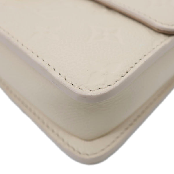 LOUIS VUITTON Metis Monogram Empreinte Leather Wallet On Chain Cream