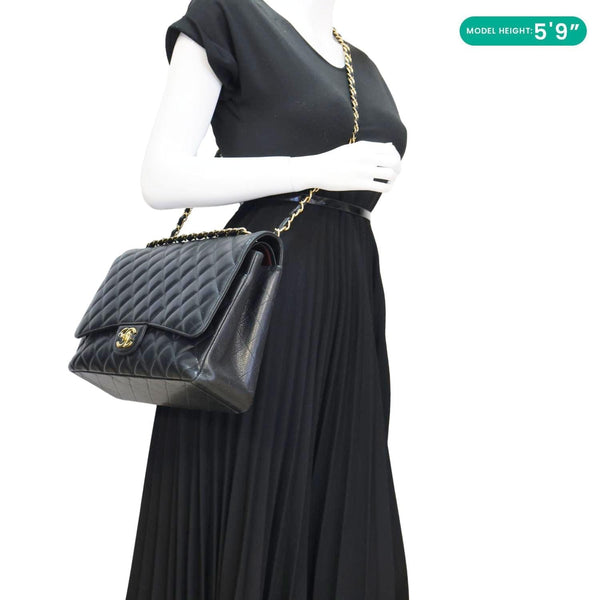 CHANEL Classic Double Flap Maxi Caviar Leather Shoulder Bag Black