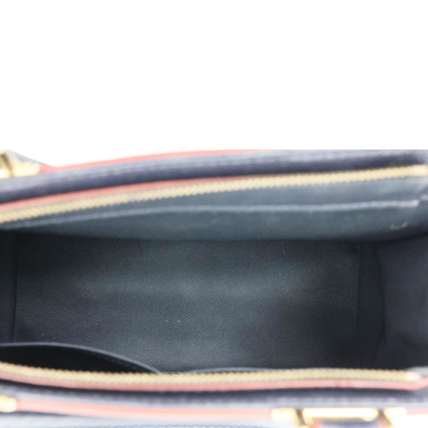 LOUIS VUITTON Sully PM Monogram Empreinte Leather Shoulder Bag Marine Rouge