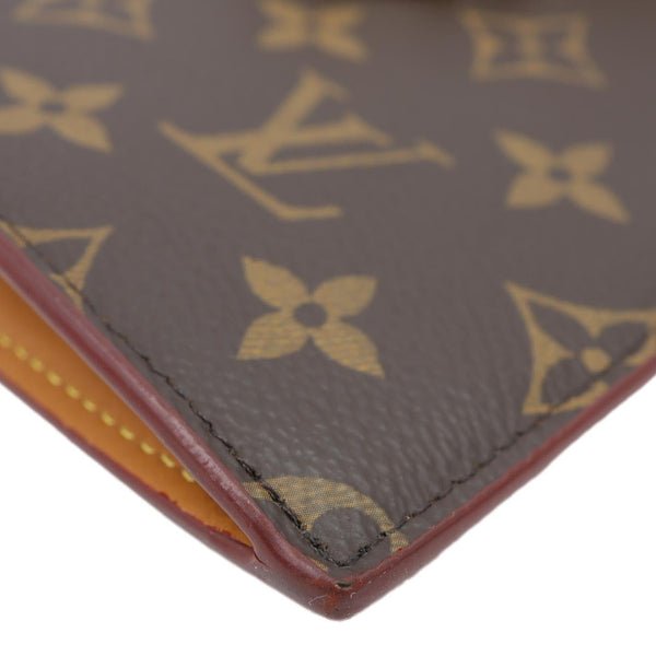 LOUIS VUITTON Legacy Monogram Canvas Chain Clutch Brown