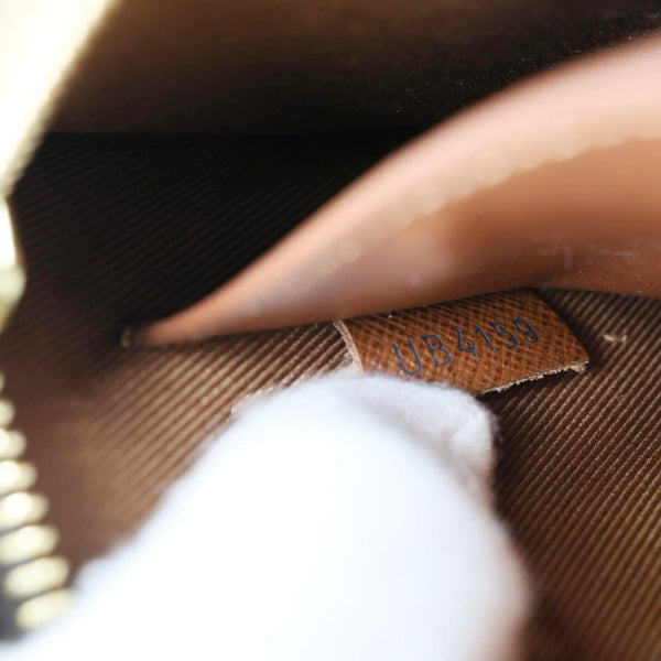 LOUIS VUITTON Legacy Monogram Canvas Chain Clutch Brown