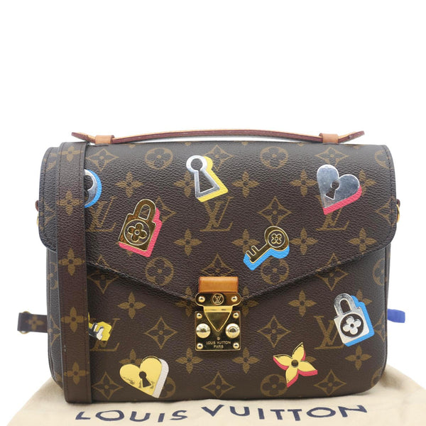 LOUIS VUITTON Lovelock Metis Pochette Patches Monogram Canvas Crossbody Bag Brown