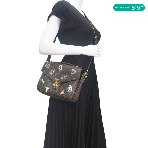 LOUIS VUITTON Lovelock Metis Pochette Patches Monogram Canvas Crossbody Bag Brown