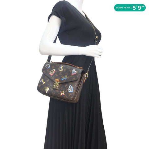 LOUIS VUITTON Lovelock Metis Pochette Patches Monogram Canvas Crossbody Bag Brown