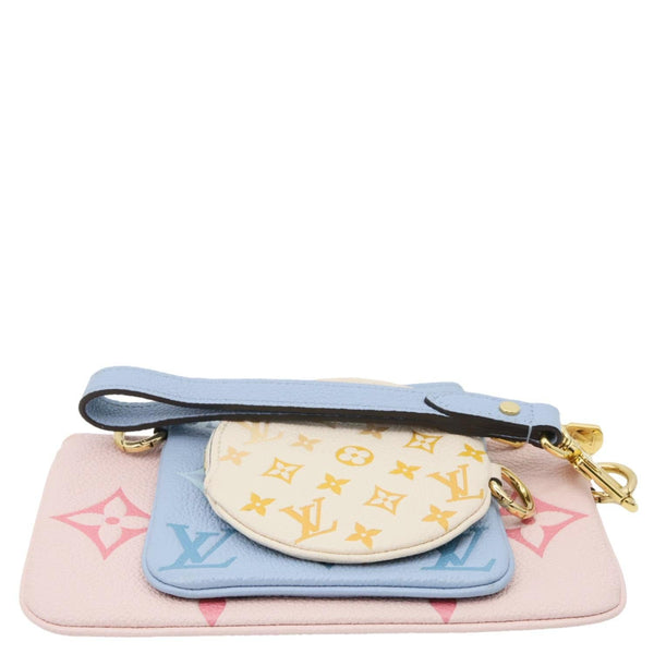 LOUIS VUITTON Trio By The Pool Giant Monogram Empreinte Leather Pouch Pink