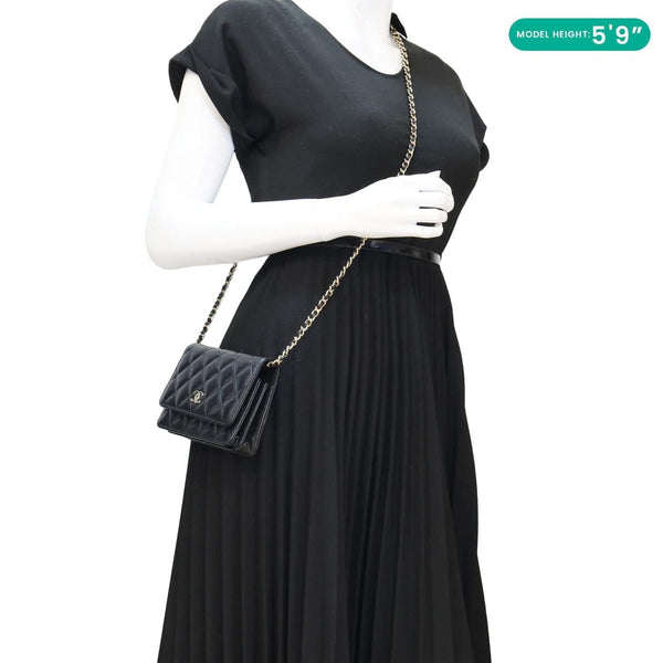 Chanel Camellia Bow Mini Black Quilted Leather WOC Crossbody Bag - Model Wearing