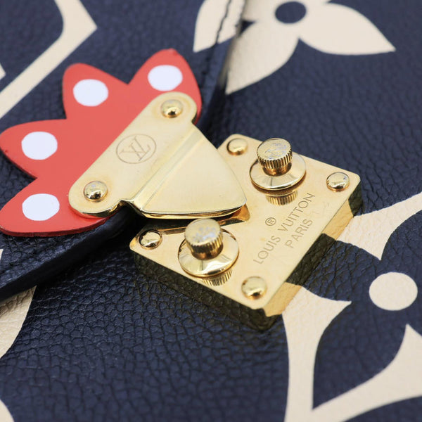 LOUIS VUITTON Metis Pochette Crafty Giant Monogram Empreinte Leather Crossbody Bag Black