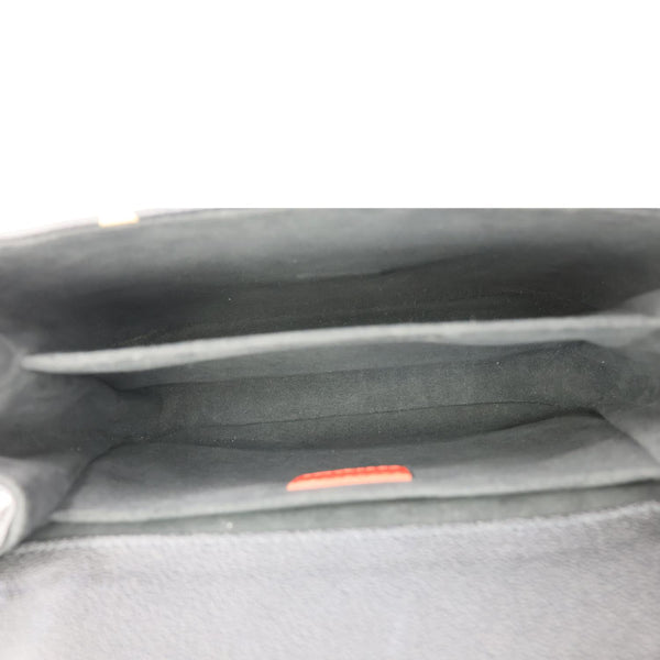 LOUIS VUITTON Metis Pochette Crafty Giant Monogram Empreinte Leather Crossbody Bag Black