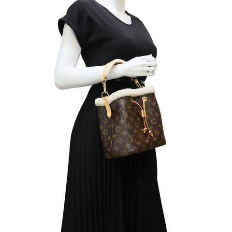 LOUIS VUITTON Neonoe BB Monogram Shearling Trimmed Bucket Bag Brown