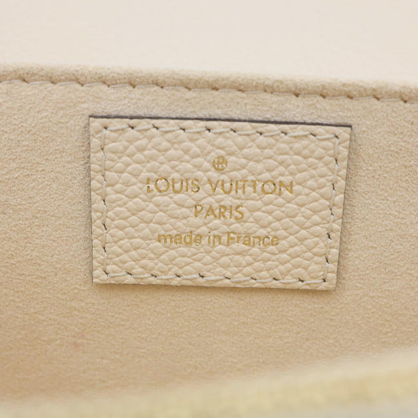 LOUIS VUITTON Metis East West Pochette Empreinte Leather Crossbody Bag Cream
