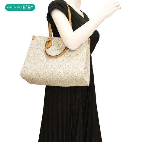 LOUIS VUITTON Since 1854 Onthego MM Jacquard Shoulder Bag Off White