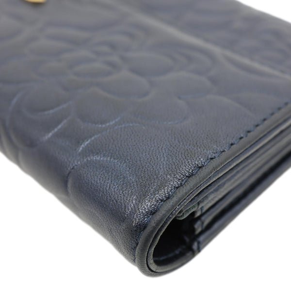 CHANEL Camellia Gusset Flap Embossed Lambskin Leather Wallet Navy Blue