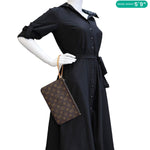 LOUIS VUITTON Monogram Canvas Wristlet Pouch Brown