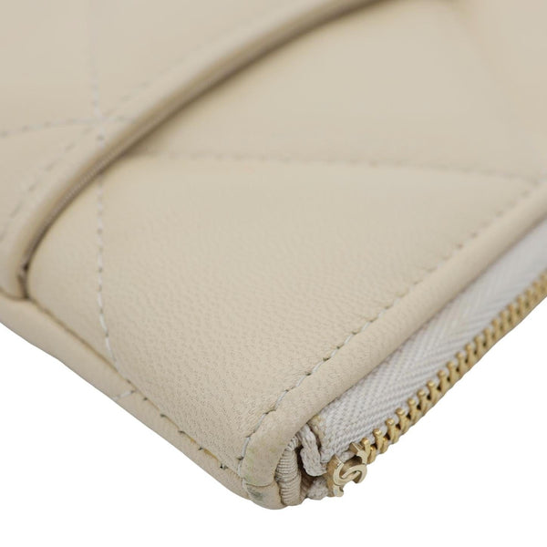 CHANEL Interlocking CC Quilted 19 Leather O-Case Off White