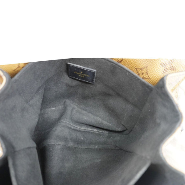 LOUIS VUITTON Metis Pochette Reverse Monogram Canvas Crossbody Bag Brown