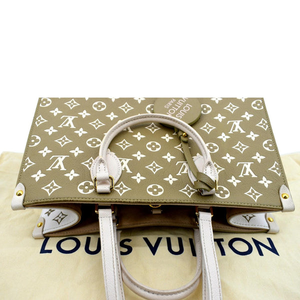 LOUIS VUITTON Women Onthego Spring City MM Monogram Empreinte Leather Shoulder Bag Bicolor