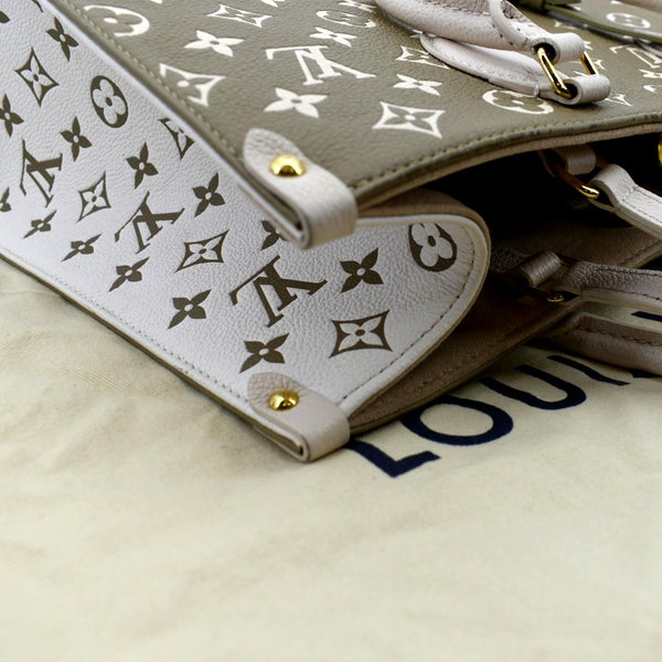 LOUIS VUITTON Women Onthego Spring City MM Monogram Empreinte Leather Shoulder Bag Bicolor