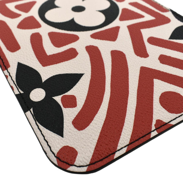 LOUIS VUITTON Neverfull Crafty Giant Monogram Canvas Wristlet Pouch Red