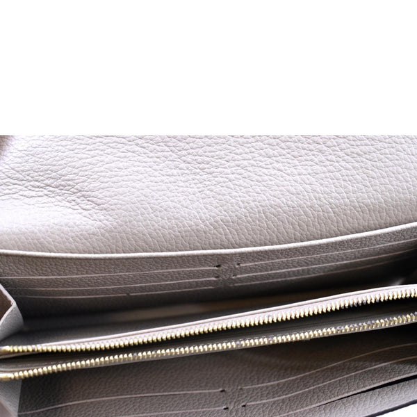 LOUIS VUITTON Sarah Monogram Empreinte Leather Wallet Tourterelle