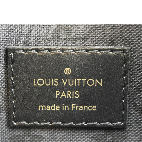 LOUIS VUITTON Neverfull Crafty Giant Monogram Canvas Wristlet Pouch Red