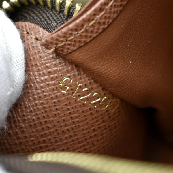 LOUIS VUITTON Monogram Canvas Zippy Wallet Brown