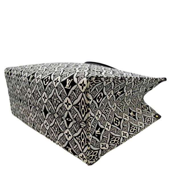 Side view of LV Onthego GM Jacquard Tote Bag