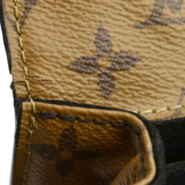 LOUIS VUITTON Metis Pochette Reverse Monogram Canvas Crossbody Bag Brown