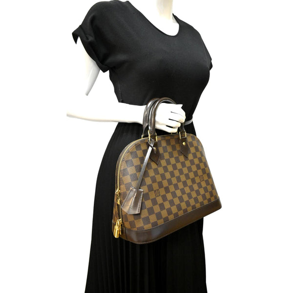 LOUIS VUITTON Alma PM Damier Ebene Satchel Bag Brown