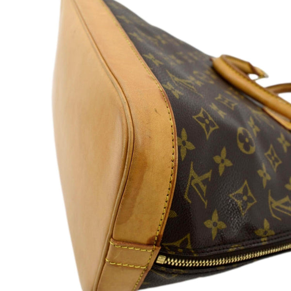LOUIS VUITTON Alma Monogram Canvas Satchel Crossbody Bag Brown