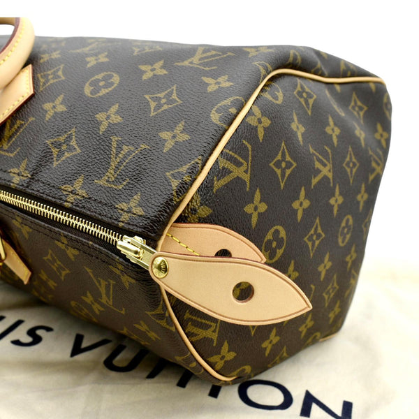 Louis Vuitton Speedy 35 Monogram Canvas Satchel Bag in brown color - Left Side