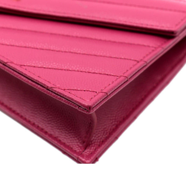 YVES SAINT LAURENT Cassandre Grain De Poudre Embossed Chain Envelope Bag Fuchsia