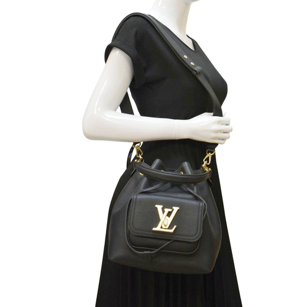 LOUIS VUITTON Lockme Leather Crossbody Bucket Bag Black