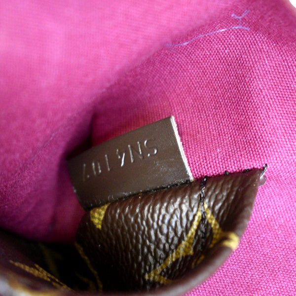 Sac de voyage Louis Vuitton Sirius en toile monogram enduite marron et cuir  naturel