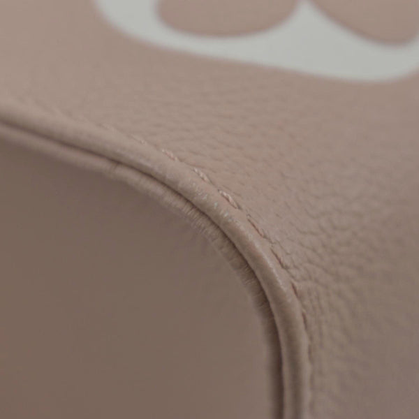 LOUIS VUITTON Onthego MM Giant Monogram Empreinte Leather Tote Shoulder Bag Rose Trianon
