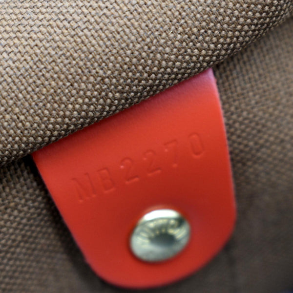 LOUIS VUITTON Keepall 50 Monogram Canvas Travel Bag Red