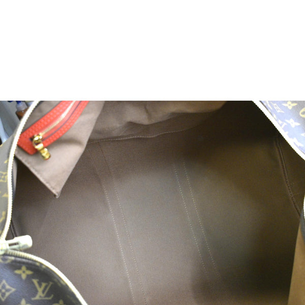 LOUIS VUITTON Keepall 50 Monogram Canvas Travel Bag Red