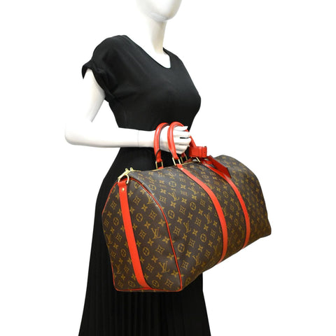 LOUIS VUITTON Keepall 50 Monogram Canvas Travel Bag Red