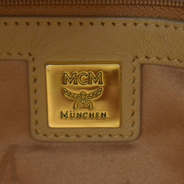 MCM Stark Studded Visetos Canvas Backpack Cognac