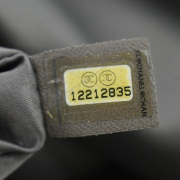 CHANEL Rodeo Drive Perforated Leather Shoulder Bag Metallic Silver