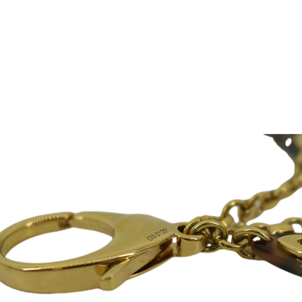 LOUIS VUITTON Tortoise Resin Insolence Monogram Bag Charm Gold