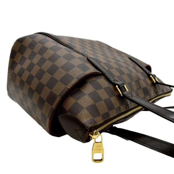 Side Pocket View of LV Damier Ebene Tote Shoulder Bag Brown