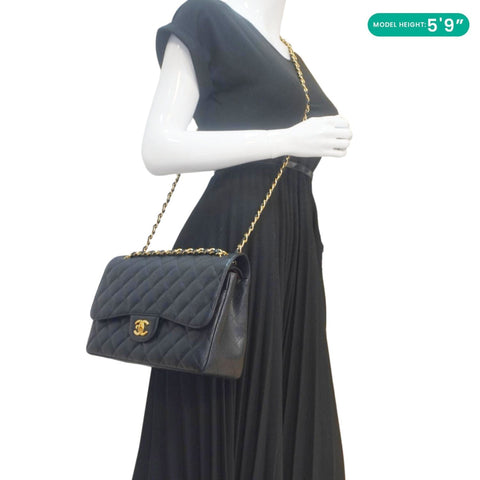 CHANEL Classic Jumbo Double Flap Quilted Caviar Leather Shoulder Bag Black