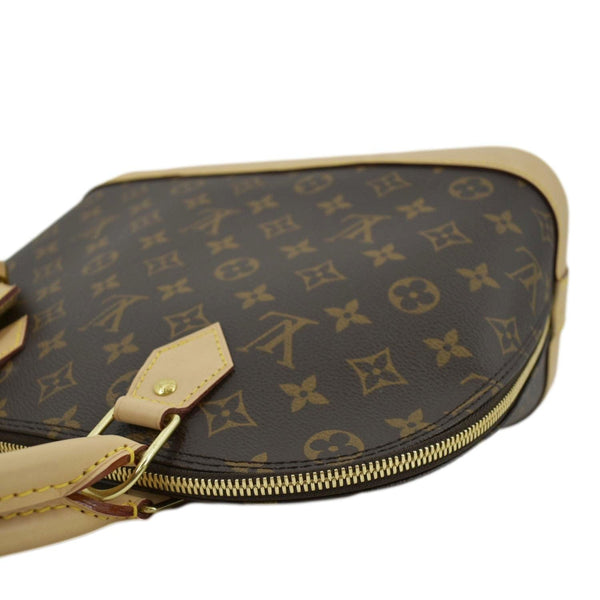 LOUIS VUITTON Alma Monogram Canvas Satchel Bag Brown