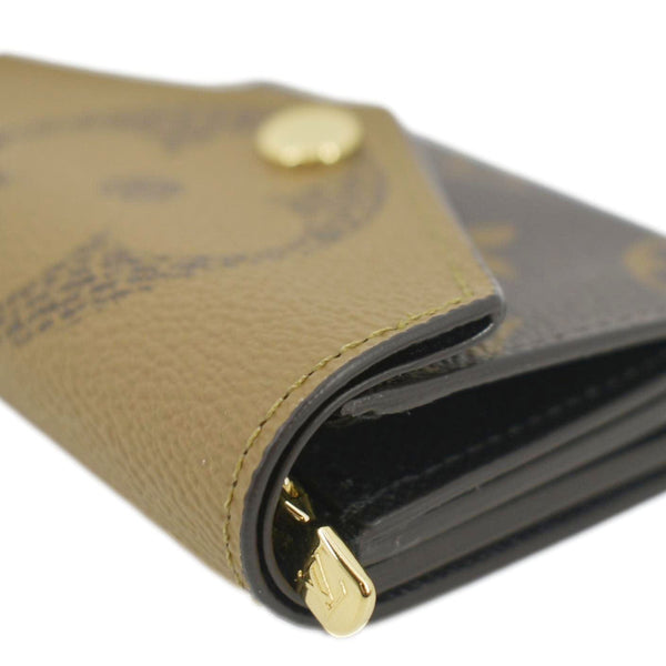 LOUIS VUITTON Zoe Monogram Reverse Canvas Wallet Brown