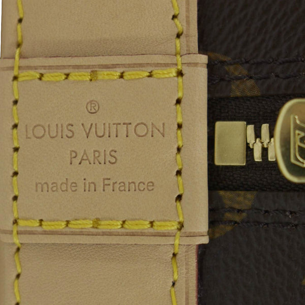 LOUIS VUITTON Alma Monogram Canvas Satchel Bag Brown