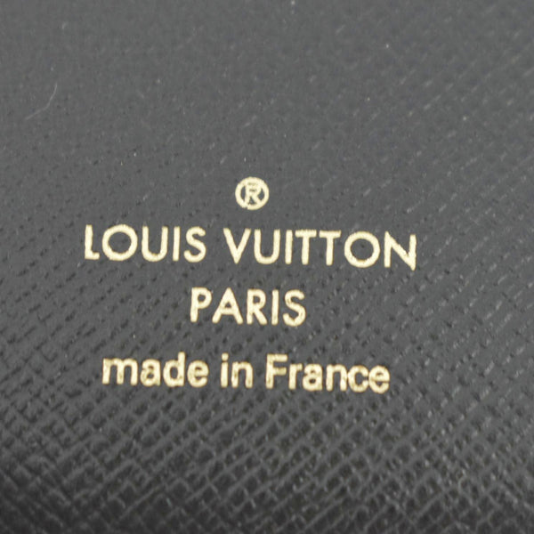 LOUIS VUITTON Zoe Monogram Reverse Canvas Wallet Brown