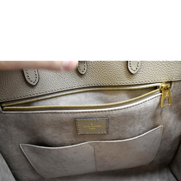 LOUIS VUITTON Onthego MM Giant Monogram Empreinte Leather Tote Bag Beige