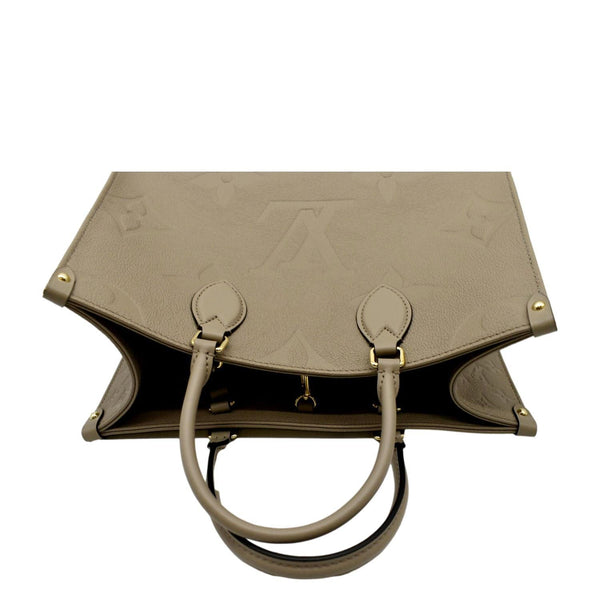 LOUIS VUITTON Onthego MM Giant Monogram Empreinte Leather Tote Bag Beige