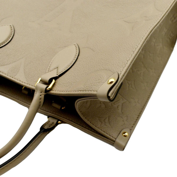 LOUIS VUITTON Onthego MM Giant Monogram Empreinte Leather Tote Bag Beige