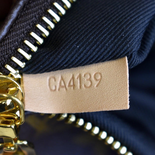 LOUIS VUITTON Monogram Canvas Bumbag Brown